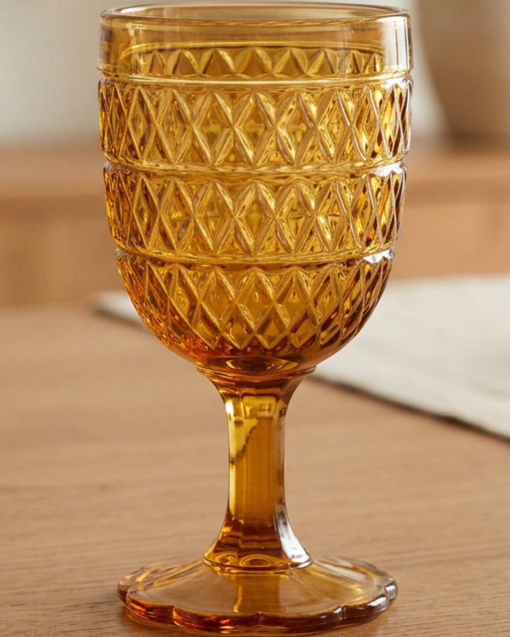 Hjxwt Eleven Ounce Diamond Lattice Footed Pressed Glass Amber - Lifestyle view
