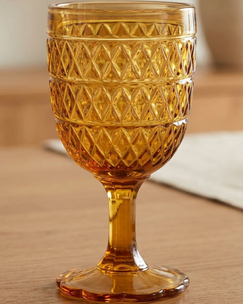Hjxwt Eleven Ounce Diamond Lattice Footed Pressed Glass Amber - Lifestyle view